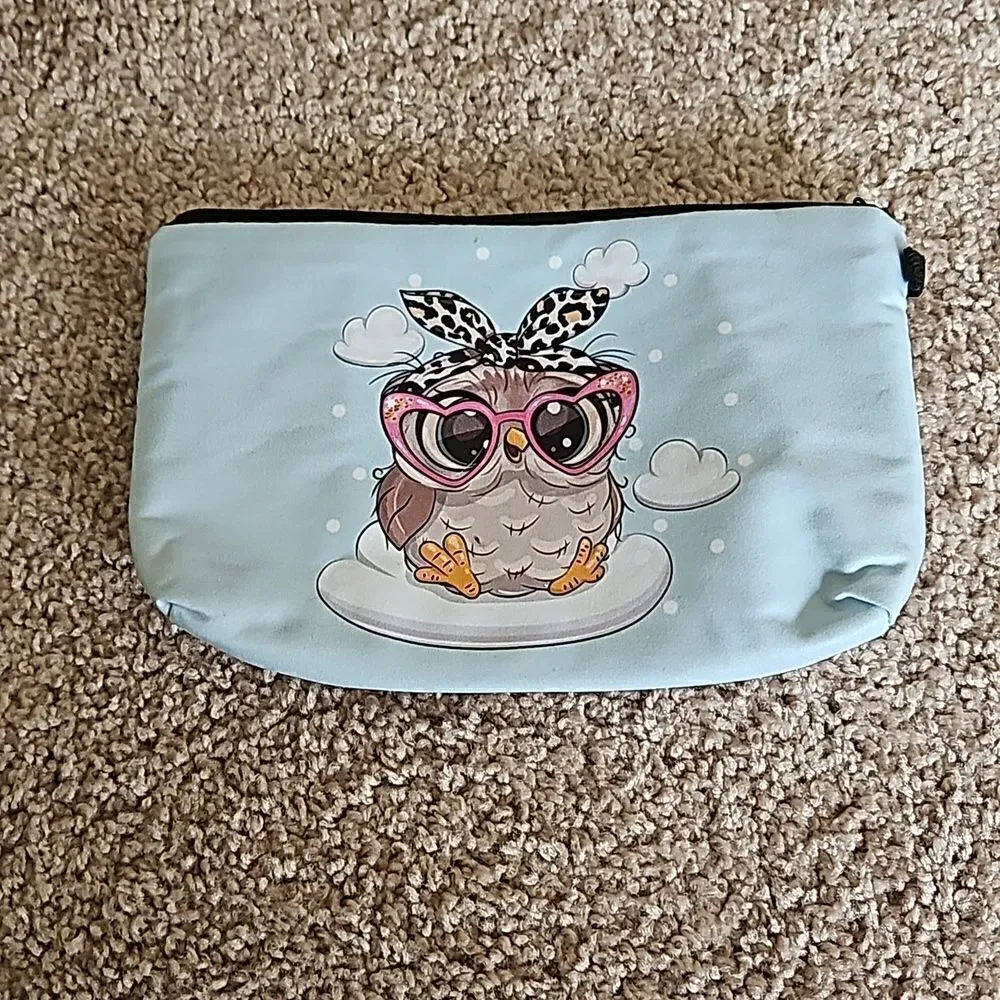 NWOT  Owl cosmetic/toiletry bag with zippered closure